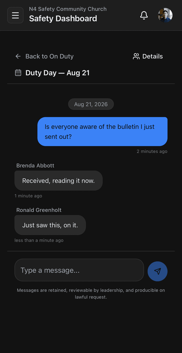 N4 Safety on-duty team messaging on a phone, showing a duty-day thread where a message asks whether the team saw the bulletin and two members reply, above a message composer and a note that messages are retained, reviewable by leadership, and producible on lawful request.